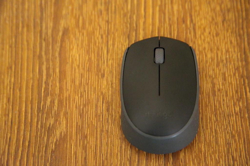 Office desk setup featuring wupabue mouse with keyboard and monitor